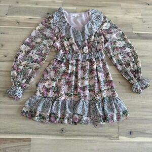 Free The Roses pink floral dress with ruffles and tie back. Size: XS